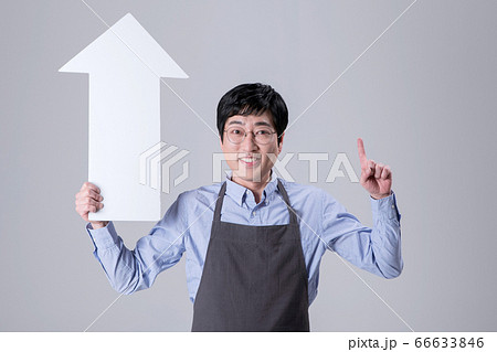 A studio portrait of Asian man making a confident smile 343 66633846