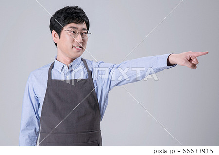 A studio portrait of Asian man making a confident smile 244 A studio portrait of Asian man making a confident smile 244 66633915
