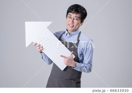 A studio portrait of Asian man making a confident smile 284 66633930