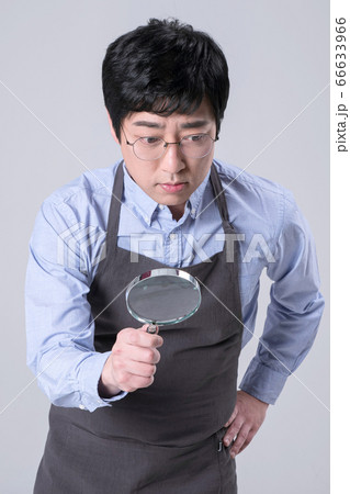 A studio portrait of Asian man making a confident smile 326 A studio portrait of Asian man making a confident smile 326 66633966