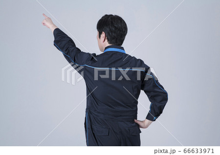 A studio portrait of Asian man making a confident smile 142 A studio portrait of Asian man making a confident smile 142 66633971