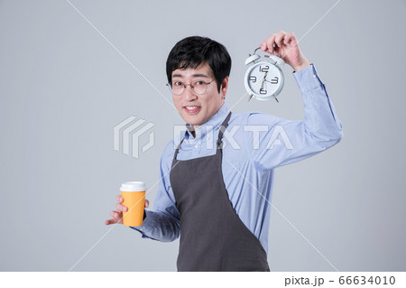 A studio portrait of Asian man making a confident smile 102 A studio portrait of Asian man making a confident smile 102 66634010