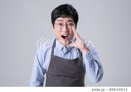 A studio portrait of Asian man making a confident smile 291 A studio portrait of Asian man making a confident smile 291 66634015