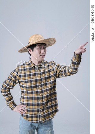 A studio portrait of Asian man making a confident smile 218 A studio portrait of Asian man making a confident smile 218 66634049