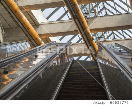 top of subway escalator up moving staircase 66635772