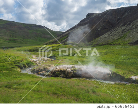 Reykjadalur valley with hot springs river and pool Reykjadalur valley with hot springs river and pool 66636453