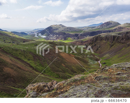 Reykjadalur valley with hot springs river with 66636470