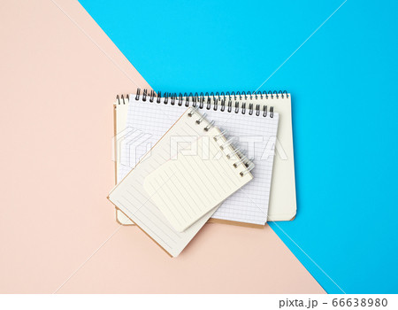 stack of spiral open notebooks with blank white stack of spiral open notebooks with blank white 66638980