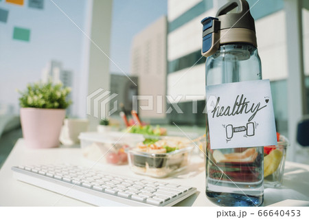Bottle of water and healthy meal lunch box set in 66640453
