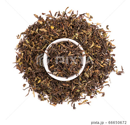 Black tea Darjeeling, isolated on white background. Organic tea. Top view. Close up. Black tea Darjeeling, isolated on white background. Organic tea. Top view. Close up. 66650672