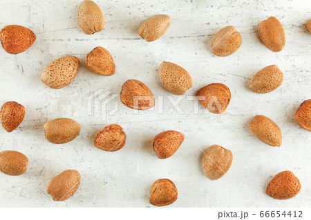 Top down view, whole almonds in shell on white 66654412