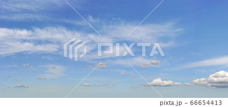 Bright sky background with few cirrus clouds above Bright sky background with few cirrus clouds above 66654413
