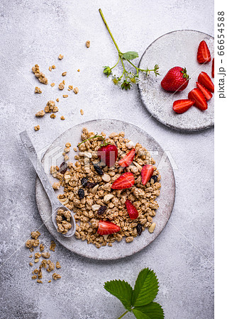 Homemade granola with fresh strawberry Homemade granola with fresh strawberry 66654588
