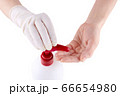Two hands and antiseptic gel isolated on white background 66654980