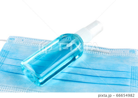 Blue medical face mask and antiseptic spray 66654982