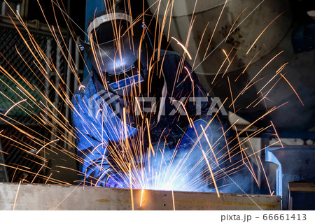 worker is welding in factory 66661413