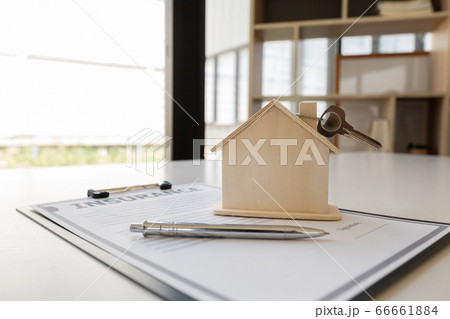 Insurance form with sample of house and keys Home insurance concept 66661884