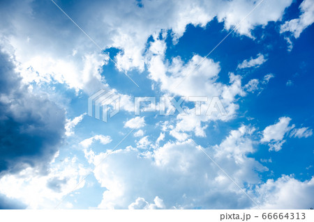 White and black clouds in the beautiful blue sky 66664313