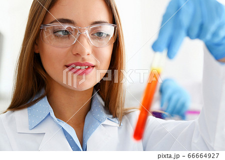 Technician hold in arms in protective gloves 66664927