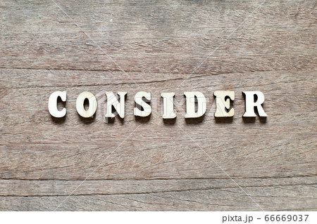 Alphabet letter block in word consider on wood background 66669037
