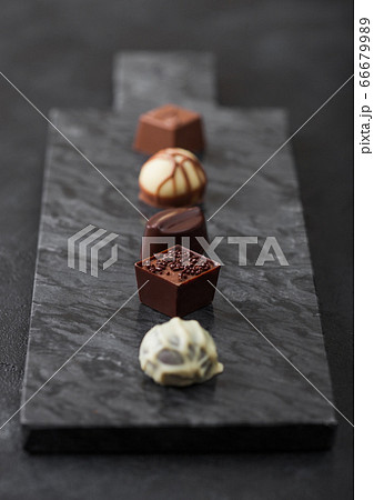 Luxury Chocolate candies selection on black marbel 66679989