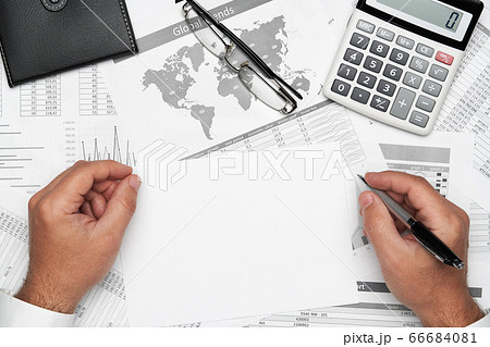 Top view of businessman working with financial Top view of businessman working with financial 66684081