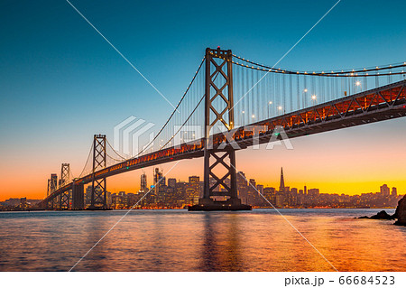 San Francisco skyline with Oakland Bay Bridge at sunset, USA San Francisco skyline with Oakland Bay Bridge at sunset, USA 66684523