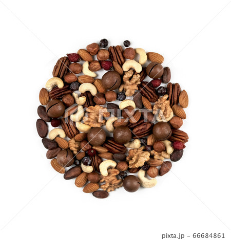 A pattern of nuts on a white background. A pattern of nuts on a white background. 66684861