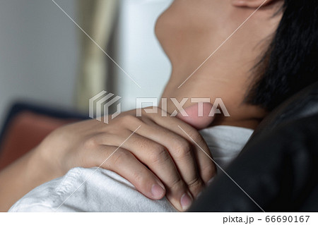 close up on the shoulders man. he is shoulder pain close up on the shoulders man. he is shoulder pain 66690167