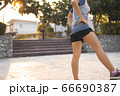 Fitness sports women warm up before have a run in 66690387