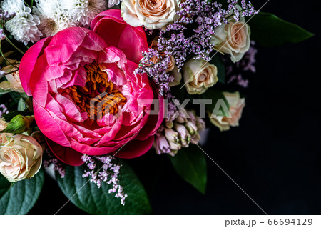 Fresh bouquet of peonies. Moody flower. Bright flower background. Fresh bouquet of peonies. Moody flower. Bright flower background. 66694129