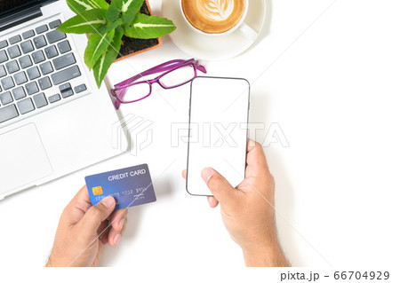 Hand  man using smartphone and credit card for 66704929