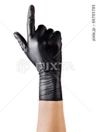 Hand in black gloves with the index finger 66705795
