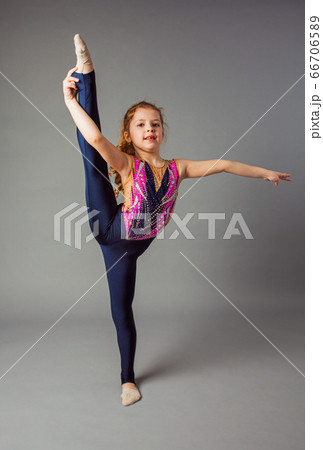 Rhythmic Gymnastics Equipment on Grey Background. Green Ball, Mace