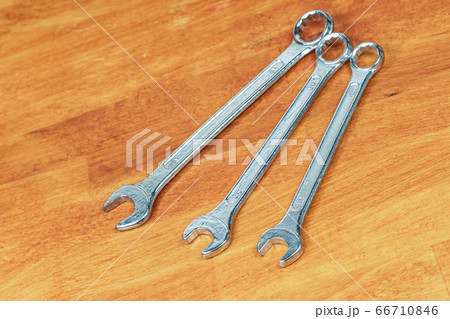 Wrench set different size tools lie in parallel on Wrench set different size tools lie in parallel on 66710846