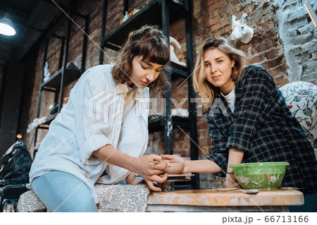 Making a handmade clay pot. Pottery lesson, hobby. 66713166