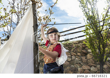 6 year old boy pretending to be a pirate 66716321