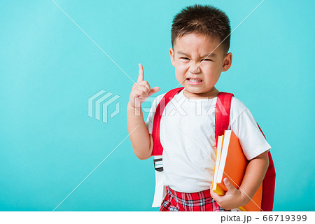 Kid from preschool kindergarten with book and Kid from preschool kindergarten with book and 66719399