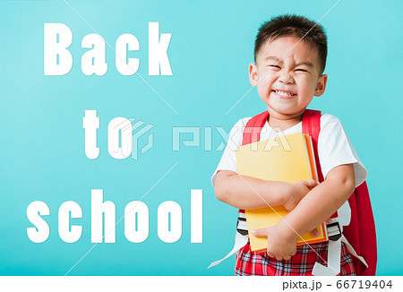 Kid from preschool kindergarten with book and Kid from preschool kindergarten with book and 66719404