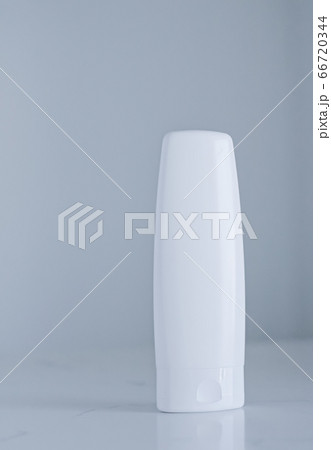 Blank label cosmetic container bottle as product mockup on gray background Blank label cosmetic container bottle as product mockup on gray background 66720344