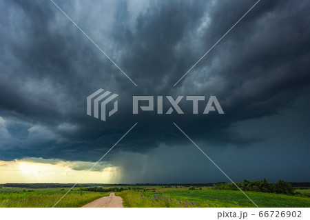 Supercell storm clouds with intense tropic rain Supercell storm clouds with intense tropic rain 66726902