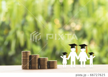 Family members, rows of rising coins with graduation cap or hat on a table. Concept Saving money for kid, child education depicts increasing in cost for paying tuition fee when study higher class 66727625