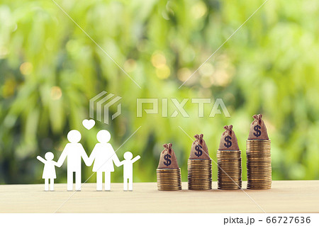 Planning for a secure future and financial status and mitigating taxes concept : Family members, US money bags on rows of rising coins on table. depicts saving for wealth and income growth 66727636