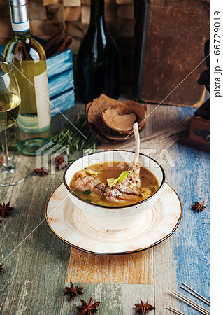 Soup with lamb ribs celery spinach and potatoes 66729019