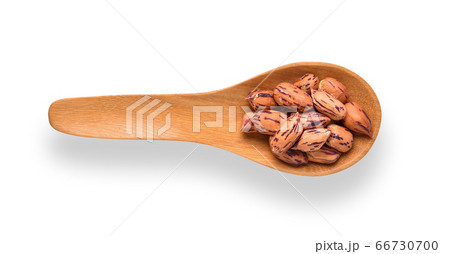 peanuts ,thai name is tiger-stripe beans in wood spoon isolated on white background. top view peanuts ,thai name is tiger-stripe beans in wood spoon isolated on white background. top view 66730700