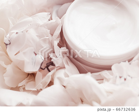 Luxe cosmetic cream jar as antiaging skincare routine product on background of peony flowers, body moisturizer and beauty branding Luxe cosmetic cream jar as antiaging skincare routine product on background of peony flowers, body moisturizer and beauty branding 66732636