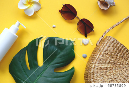 Flat lay traveler accessories on yellow background. vacation concept. 66735899