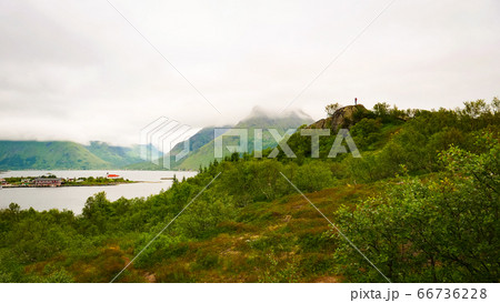Fjord landscape with church. Lofoten Norway 66736228