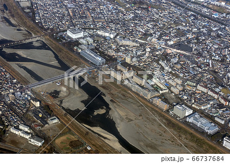 多摩川の関戸橋上空から京王線中河原駅付近を空撮 多摩川の関戸橋上空から京王線中河原駅付近を空撮 66737684