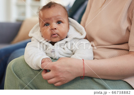 Parents holding Cute Baby 66738882